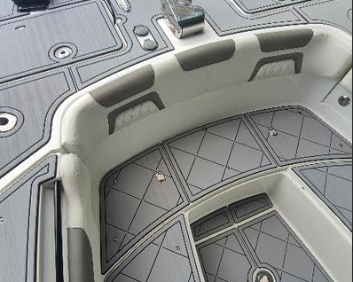 Textured FlexDek marine boat flooring with routed panels designed for grip when wet